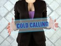 COLD CALLING inscription on the screen. Cold callingÃÂ typically refers to solicitation by phone or telemarketing